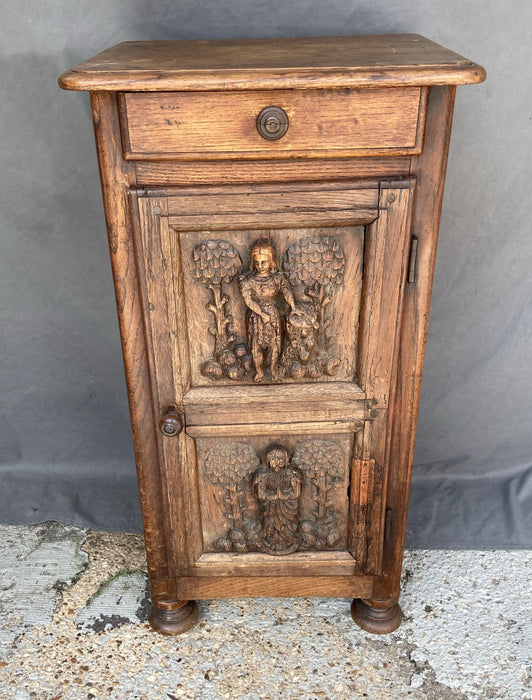 EARLY FIGURAL CARVED OAK SIDE CABINET