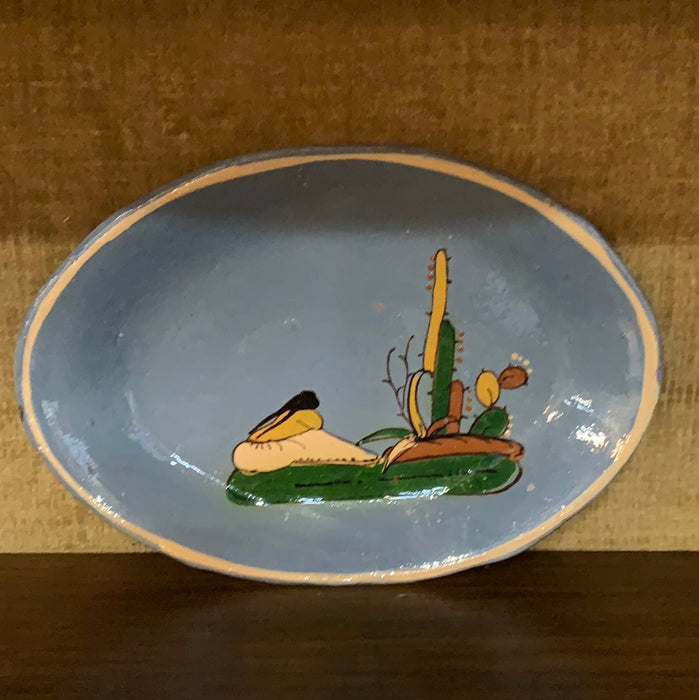 BLUE MEXICAN POTTERY PLATE WITH PERSON AND CACTI
