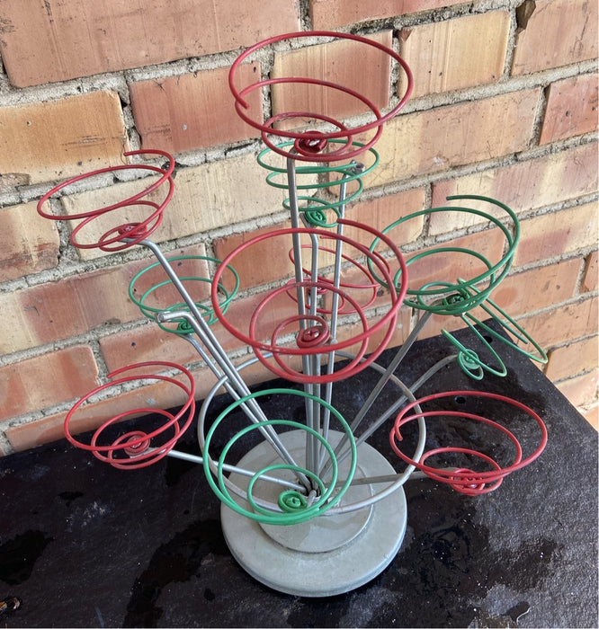 SCULPTURAL ODDITY ADOURNED WITH COLORFUL SPRINGS