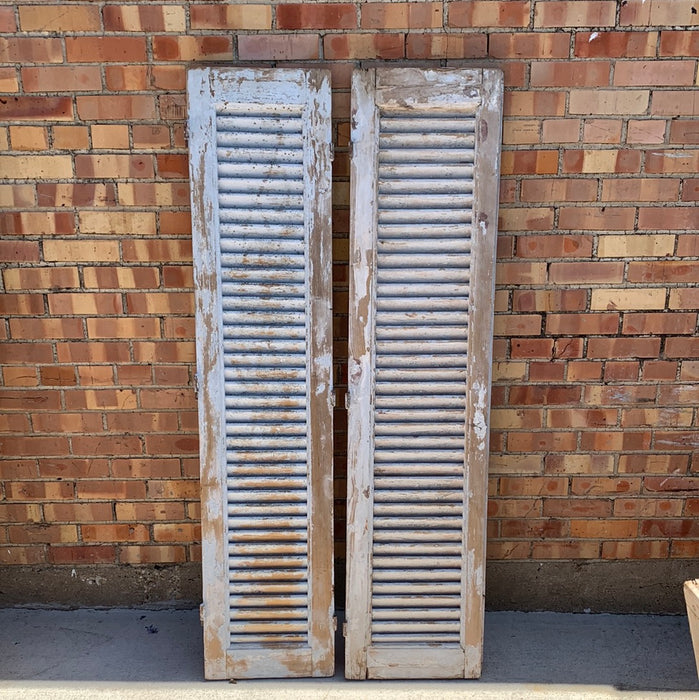 PAIR OF MEDIUM DISTRESSED GREY SHUTTERS