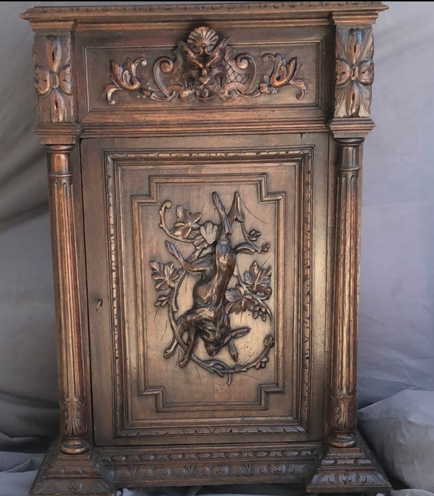 TALL OAK JAM CUPBOARD WITH RABBIT AND LION