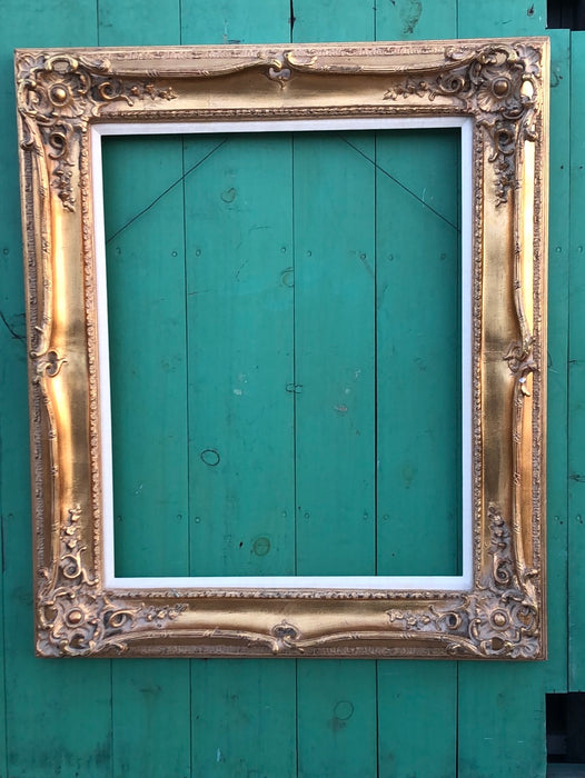 ORNATE GILT COMPOSITION FRAME