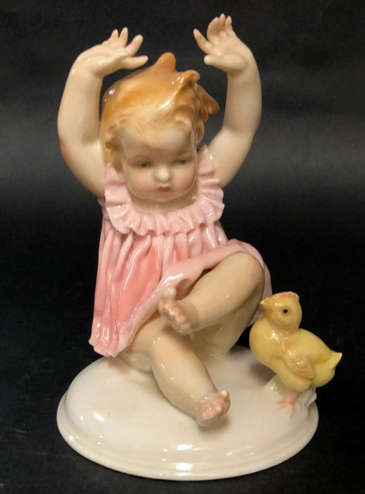 GERMAN PORCELAIN BABY GIRL WITH CHICK