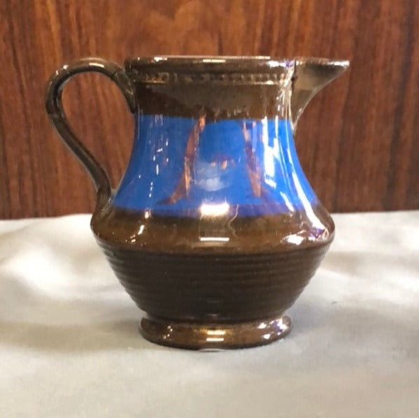 TINY COPPER LUSTER PITCHER WITH BLUE BAND