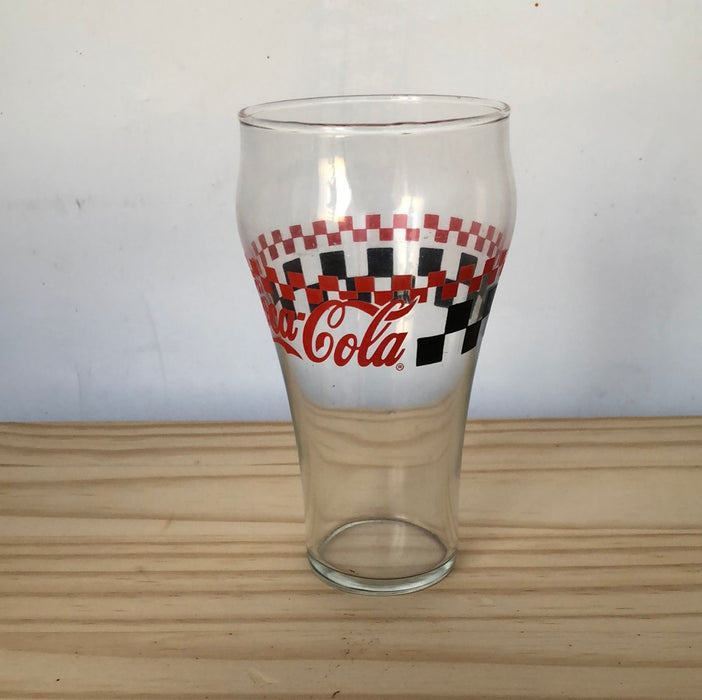 16 ounce black and red checkered Coca-Cola glass