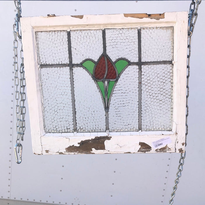 STAINED GLASS WINDOW WITH RED FLOWER AND GREEN LEAVES