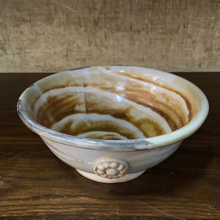 SWIRLY STUDIO POTTERY BOWL WITH FLOWER APPLIQUE