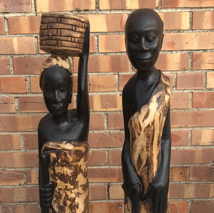 PAIR OF CARVED WOOD AFRICAN MAN AND WOMAN STATUES