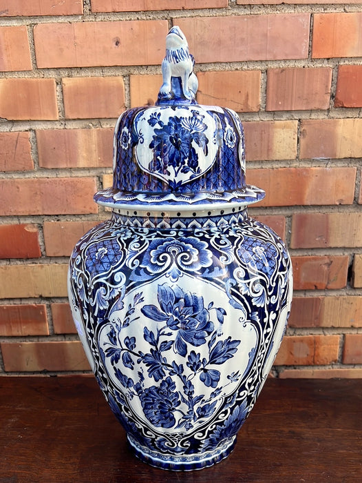 LARGE BLUE AND WHITE DELFT URN WITH FOO DOG
