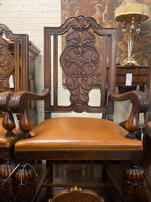 PAIR OF CARVED TUDOR OAK ARM CHAIRS