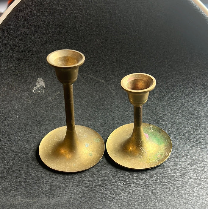 PAIR OF SMALL BRASS CANDLE STICKS (TWO DIFFERENT SIZES)
