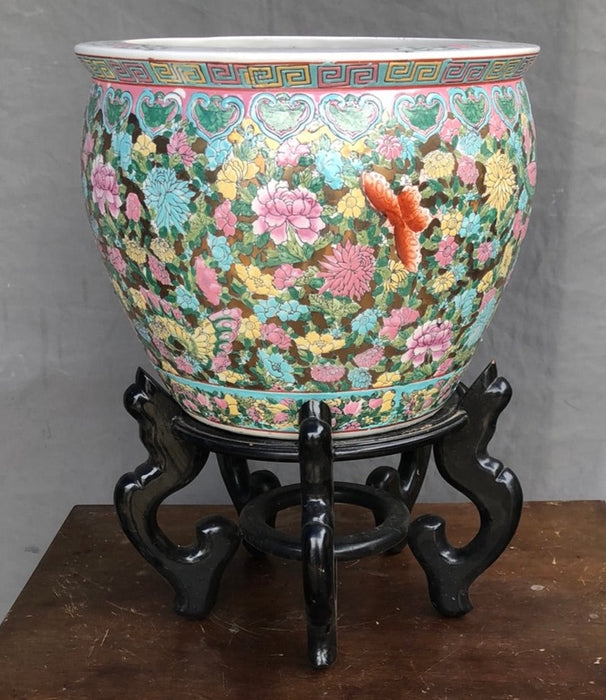 CHINESE PLANTER WITH FLOWERS ON BLACK STAND