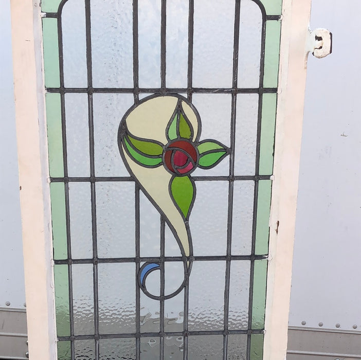 TALL STAINED GLASS WINDOW WITH RED ROSE AND GREEN BORDER