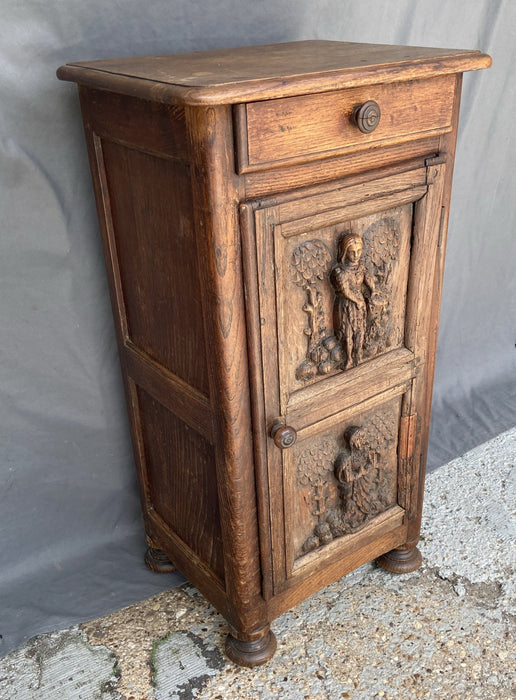 EARLY FIGURAL CARVED OAK SIDE CABINET