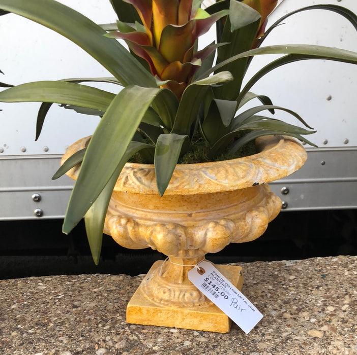 PAIR OF YELLOW METAL URN PLANTERS