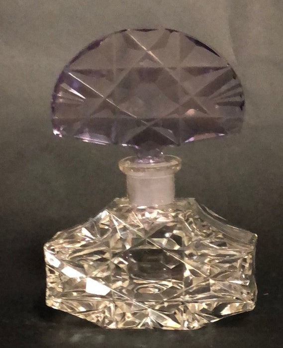 CLEAR PERFUME BOTTLE WITH PURPLE TOP