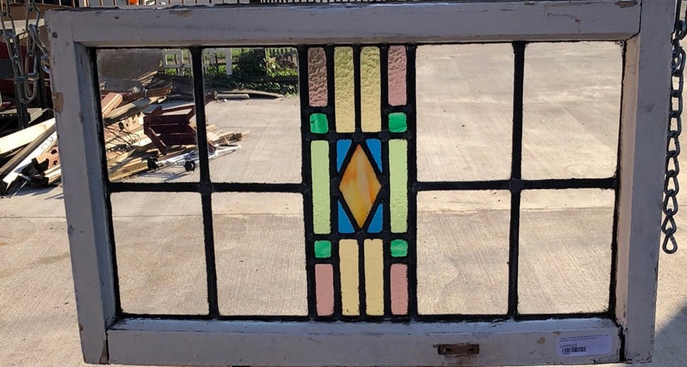 SMALL STAINED GLASS WINDOW WITH YELLOW DIAMOND IN MULTI COLORS - 9 PANES