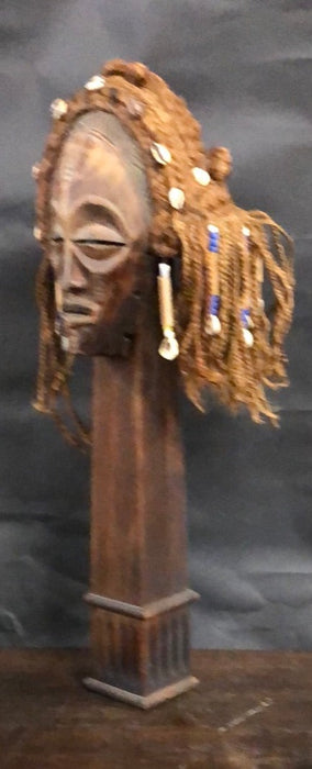 CARVED AFRICAN MASK ON STAND