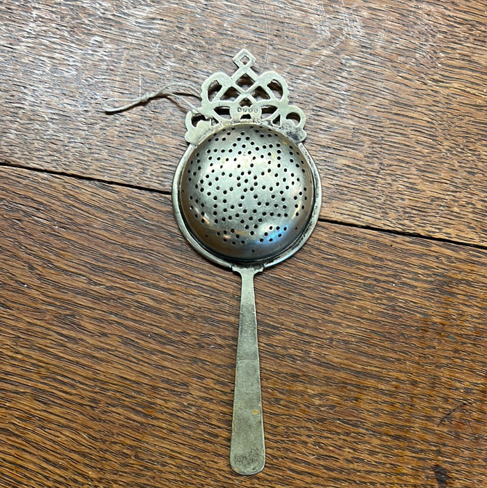 SILVERPLATE TEA STRAINER WITH HANDLE (AND HALLMARK)