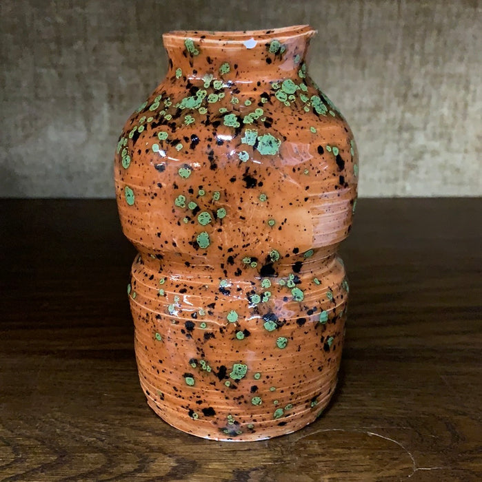 ORANGE AND GREEN SPECKLED GLAZED POTTERY VASE