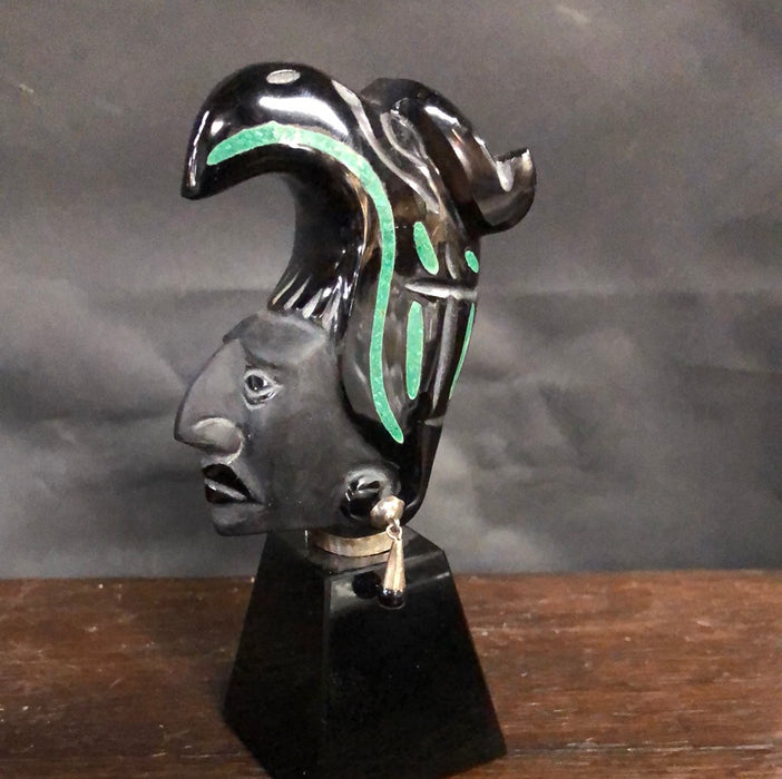 SMALL OBSIDIAN AFRICAN HEAD STATUE