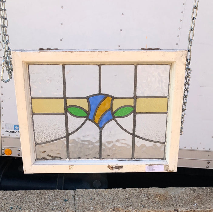 STAINED GLASS WINDOW WITH BLUE AND GOLD FLOWER