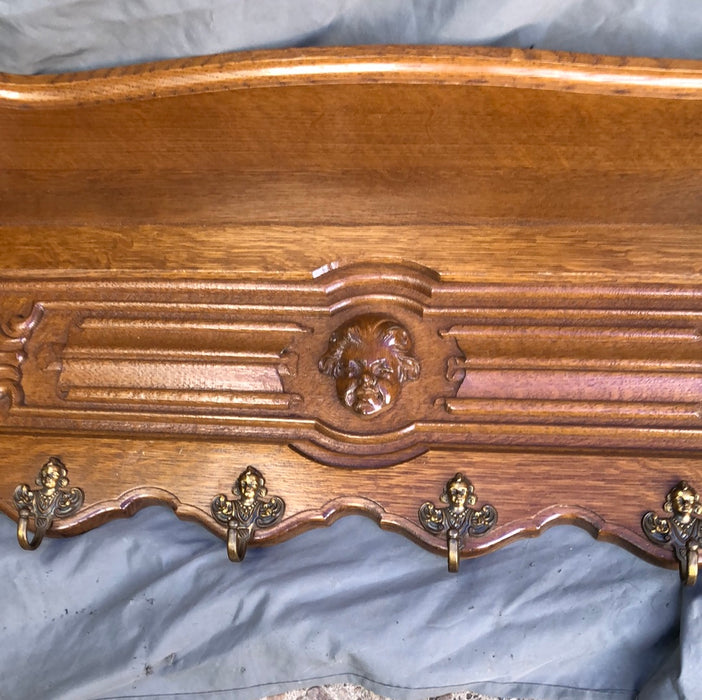 LARGE OAK WALL SHELF WITH CHERUB HEAD