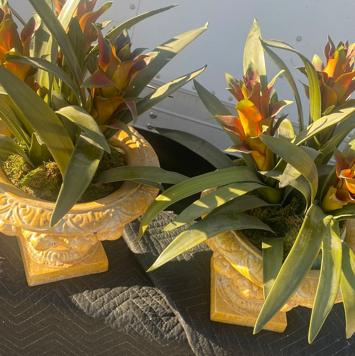 PAIR OF YELLOW METAL URN PLANTERS