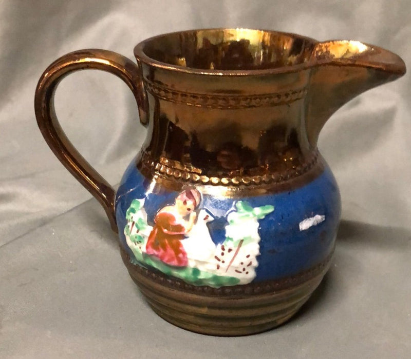 SMALL COPPER LUSTER PITCHER WITH WOMAN AND DUCK