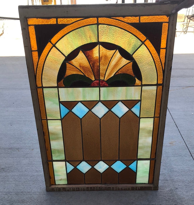 ENGLISH STAINED GLASS WINDOW WITH FAN DESIGN