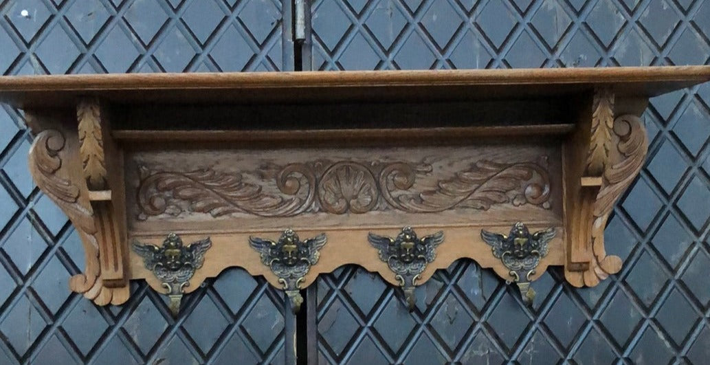 SMALL SHELL CARVING OAK WALL SHELF WITH CHERUB HOOKS