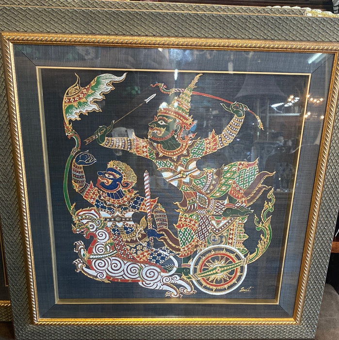 PAIR OF PAINTED CLOTH THAI WARRIORS IN BLUE LINEN FRAME WITH GOLD TRIM