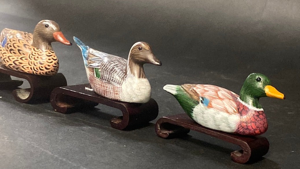 SMALL SET OF 3 CARVED DUCKS