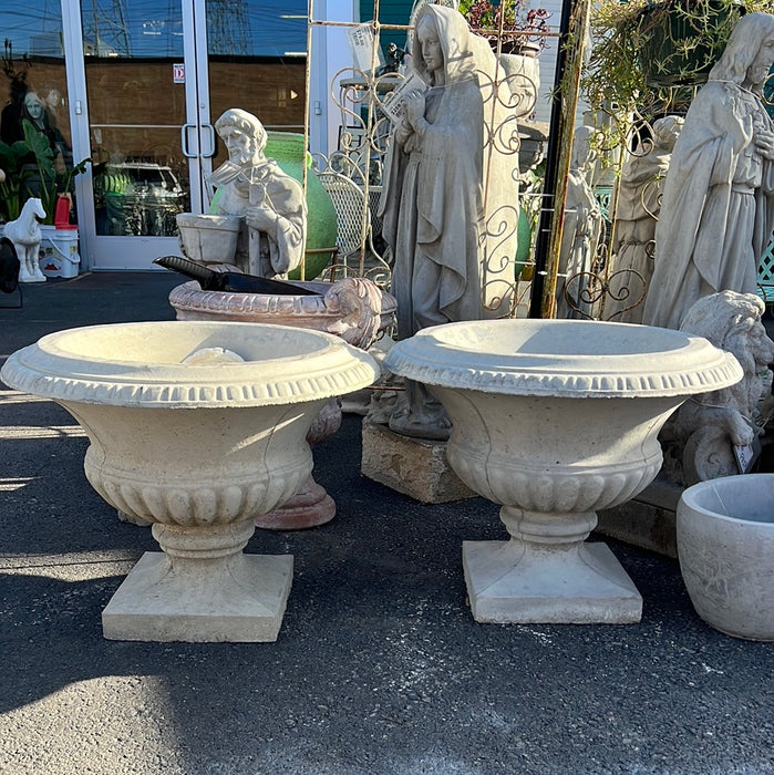 PAIR OF CONCRETE PLANTERS