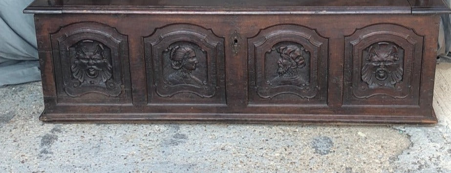 TALL PORTRAIT CARVED BENCH  WITH LARGE ARM