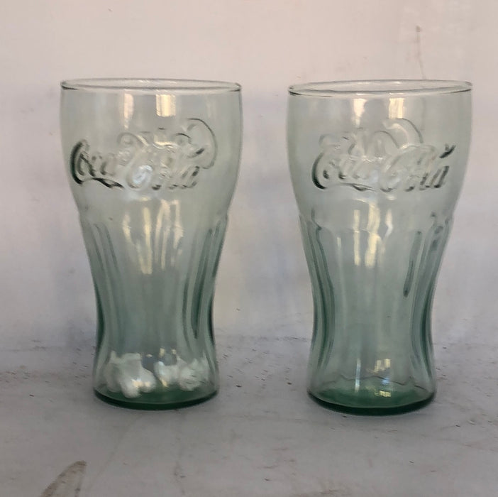 Pair of green Coca-Cola bottle shaped glasses