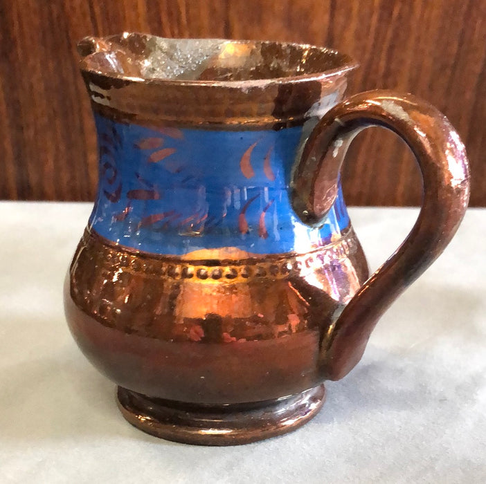 SMALL COPPER LUSTER PITCHER WITH FOLLIATE BLUE BAND