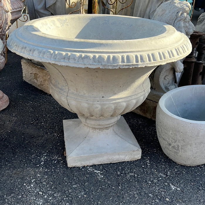 PAIR OF CONCRETE PLANTERS