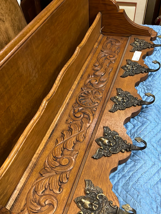 LIGHT OAK WALL SHELF WITH SHELLS AND CHERUB HOOKS