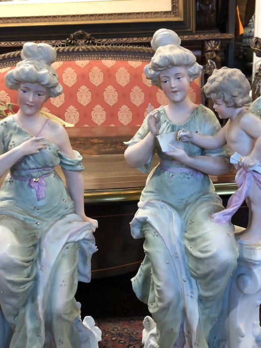 PAIR OF LARGE BISQUE LADY WITH CHERUBS FIGURES