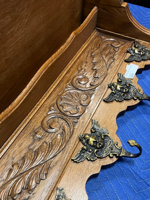 SMALL SHELL CARVING OAK WALL SHELF WITH CHERUB HOOKS