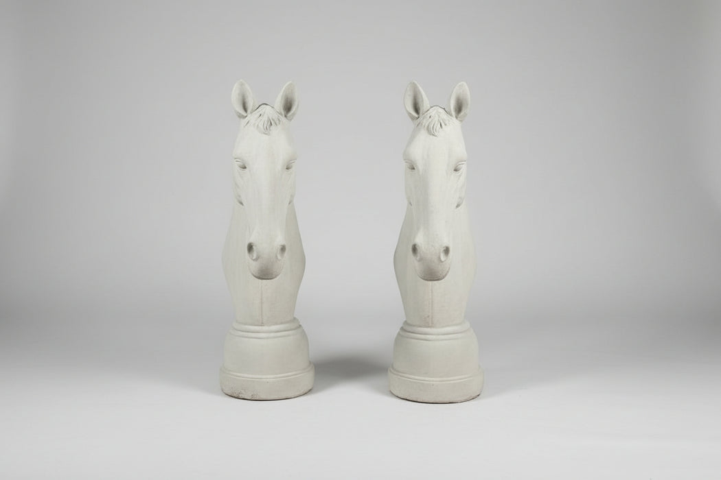 PAIR OF CONCRETE HORSE HEADS