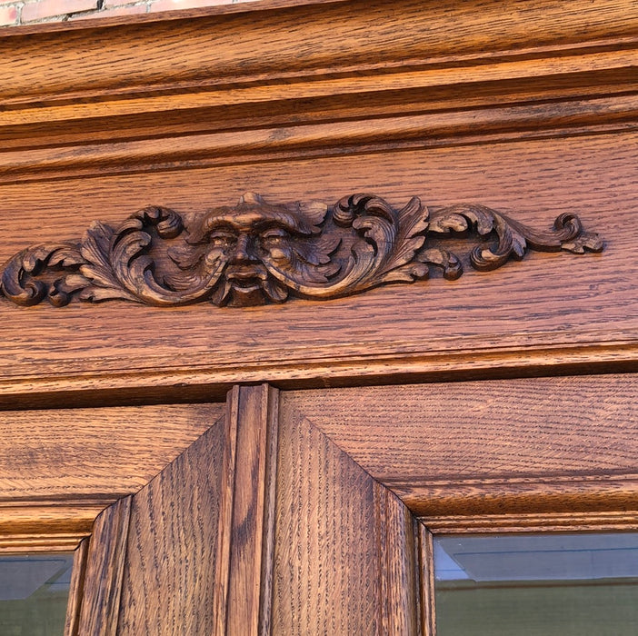 GREEN MAN LOUIS XIII BEVELED GLASS OAK BOOKCASE