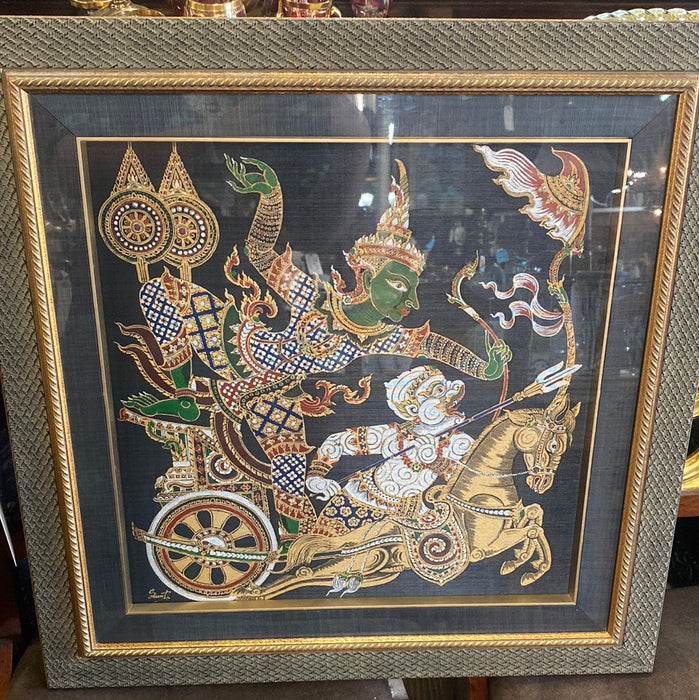 PAIR OF PAINTED CLOTH THAI WARRIORS IN BLUE LINEN FRAME WITH GOLD TRIM