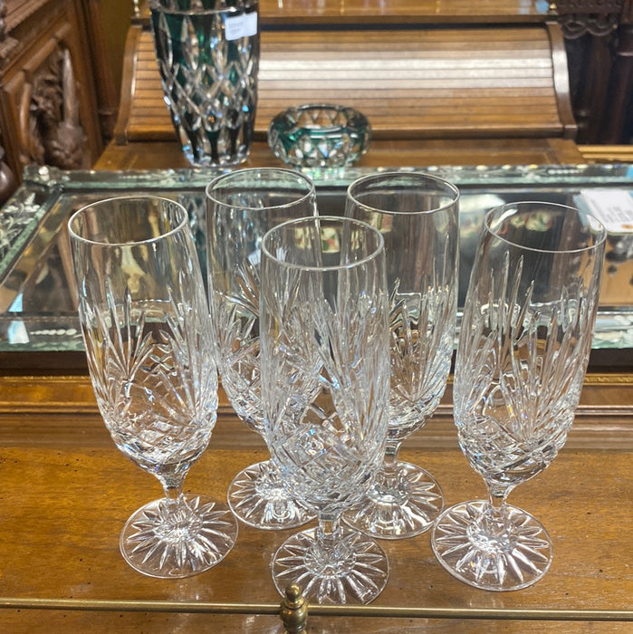 SET OF FIVE CRYSTAL STEMMED CHAMPAGNE FLUTES