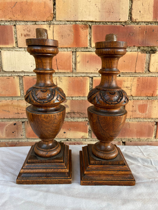 PAIR OF SHORT CARVED OAK POSTS