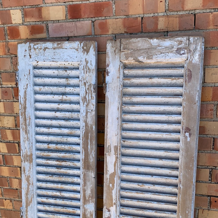 PAIR OF MEDIUM DISTRESSED GREY SHUTTERS
