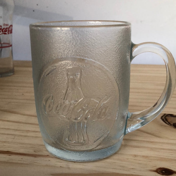 CLEAR GLASS EMBOSSED COCA-COLA MUG