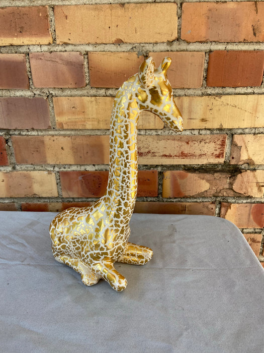 GOLD AND WHITE GIRAFFE FIGURE