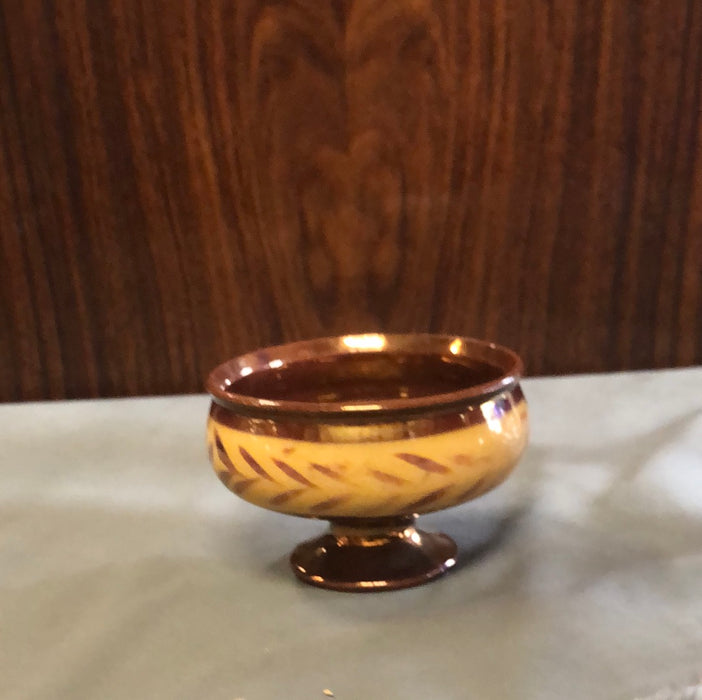 COPPER LUSTER FOOTED DISH WITH YELLOW BAND PINWHEEL